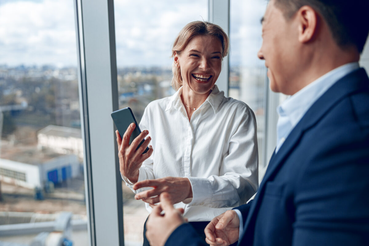 Business professionals having a one-on-one conversation